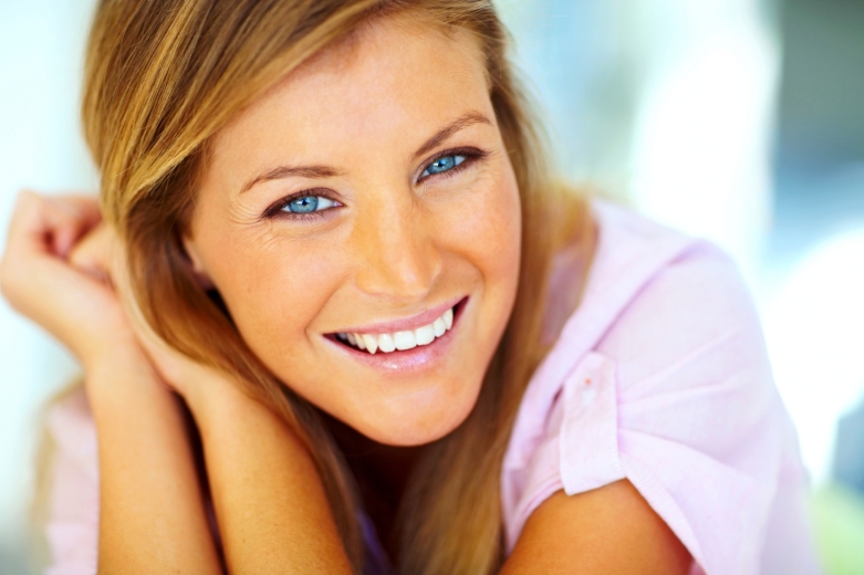 Closeup portrait of an attractive young woman posing